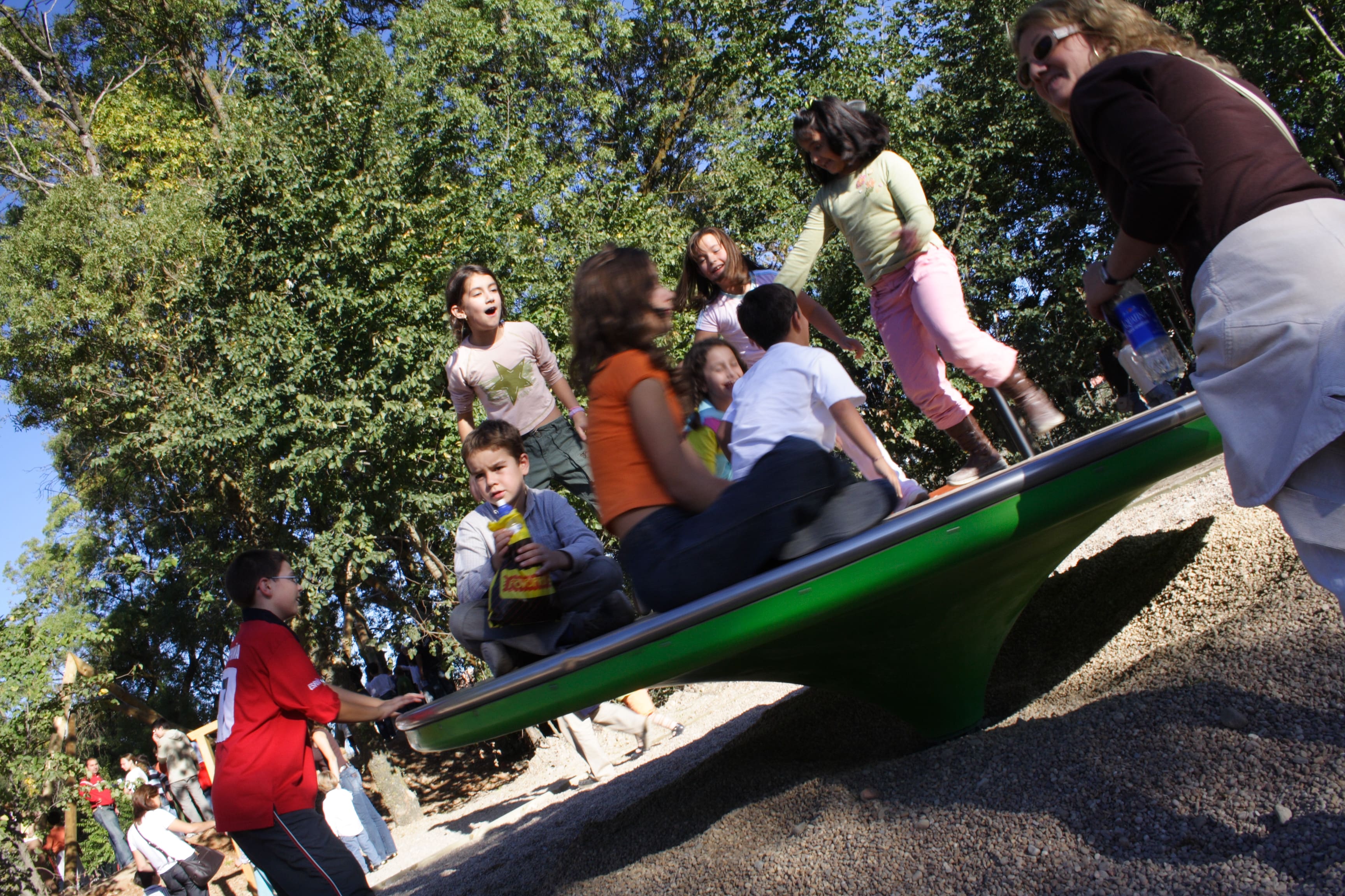 Giant Revolving Disc a large wooden roundabout or spinner for playgrounds